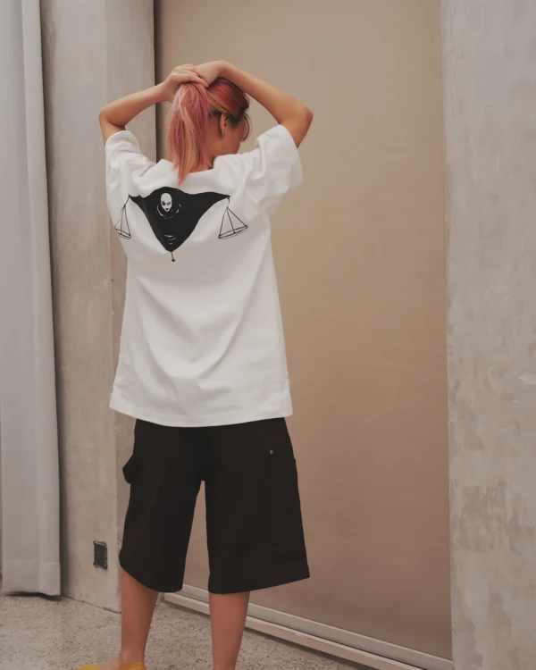 Back print of the Higuruma tee on model